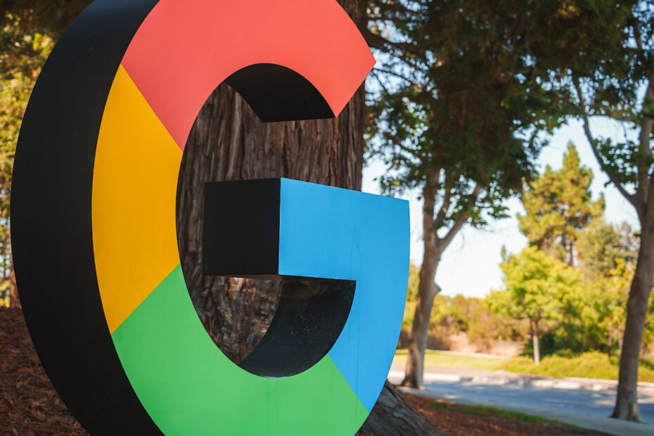 D letter 'G' resembling Google logo colors outdoors in a park like setting. No specific location provided, possibly near Google office or campus.